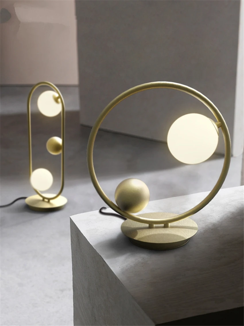 Post Modern Glass Ball Table Lamps G4 Nordic Living Room Decorative Bedroom Bedside Oval Night Desk Lights Art Deco Luminaires
Post Modern Glass Ball Table Lamps G4 Nordic Living Room Decorative Bedroom Bedside Oval Night Desk Lights Art Deco Luminaires