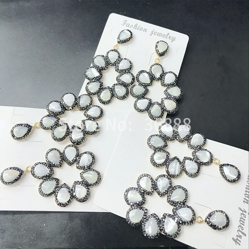 New fashion shell earrings with petal black crystal Bohemian exaggerated personality accessories
New fashion shell earrings with petal black crystal Bohemian exaggerated personality accessories