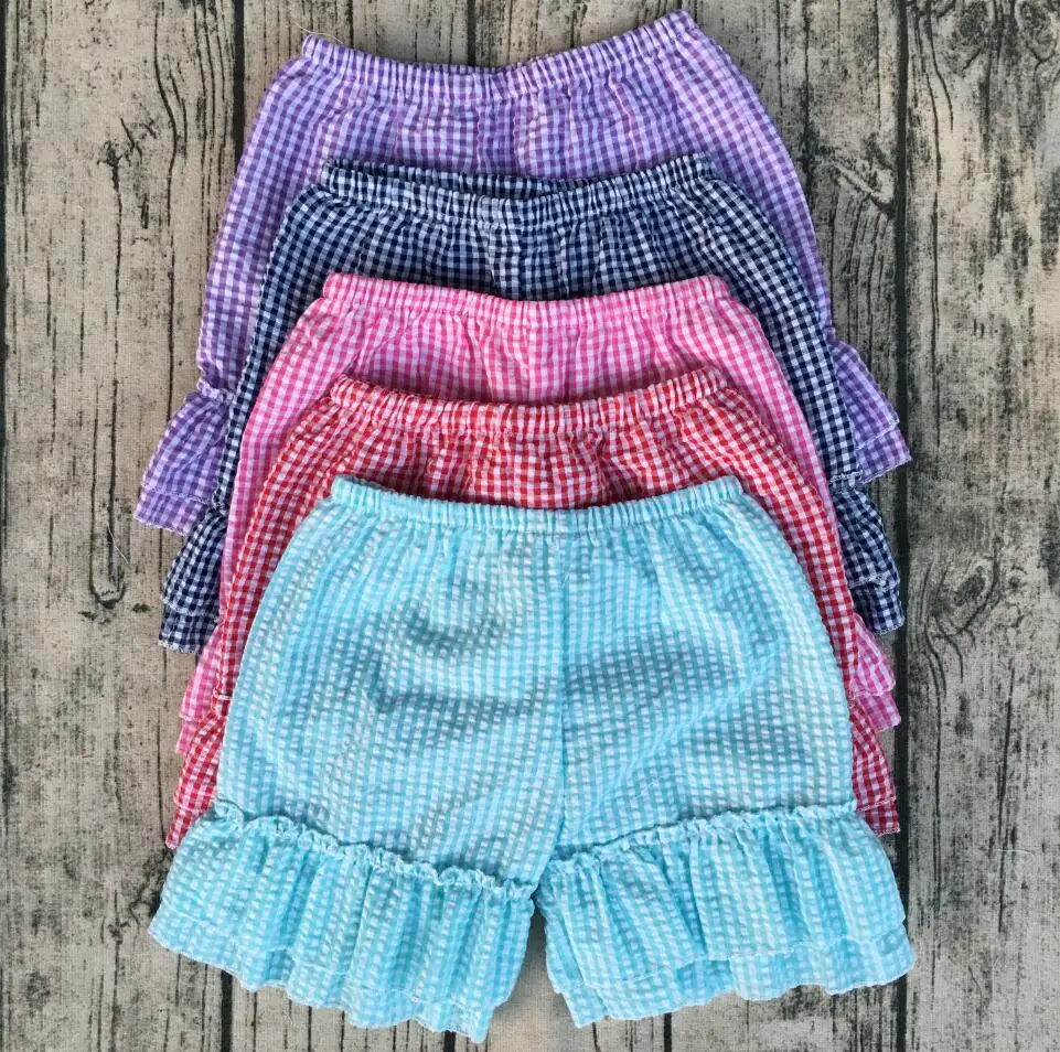 children seersucker shorts with fashion design double ruffle clothing suppliers china
children seersucker shorts with fashion design double ruffle clothing suppliers china