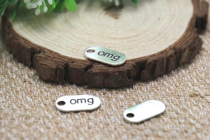 30pcs-Omg Charms Omg Sign, Antique Tibetan silver Omg Charms Omg Sign pendants 18x9mm 
30pcs-Omg Charms Omg Sign, Antique Tibetan silver Omg Charms Omg Sign pendants 18x9mm