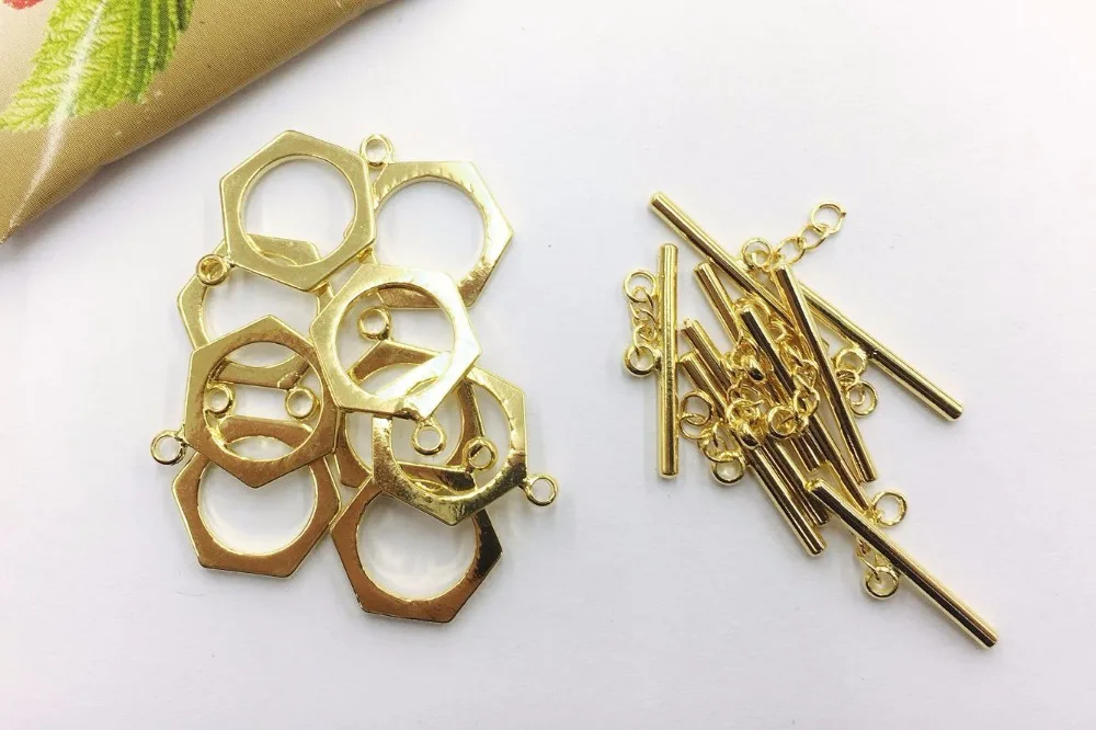 50 sets Hexagon simple OT buckle gold-plated DIY jewelry tail buckle Glossy necklace wild buckle OT bracelet necklace button
50 sets Hexagon simple OT buckle gold-plated DIY jewelry tail buckle Glossy necklace wild buckle OT bracelet necklace button