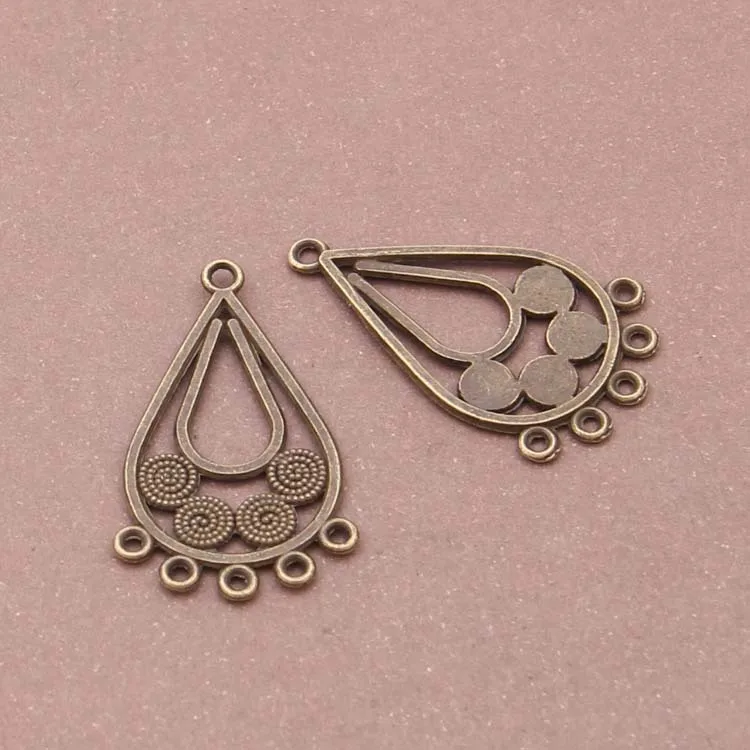 100pcs Wholesale Earring Making DIY Connector Charms Antique Bronze Color Waterdrop Charms 17*30mm AA567
100pcs Wholesale Earring Making DIY Connector Charms Antique Bronze Color Waterdrop Charms 17*30mm AA567