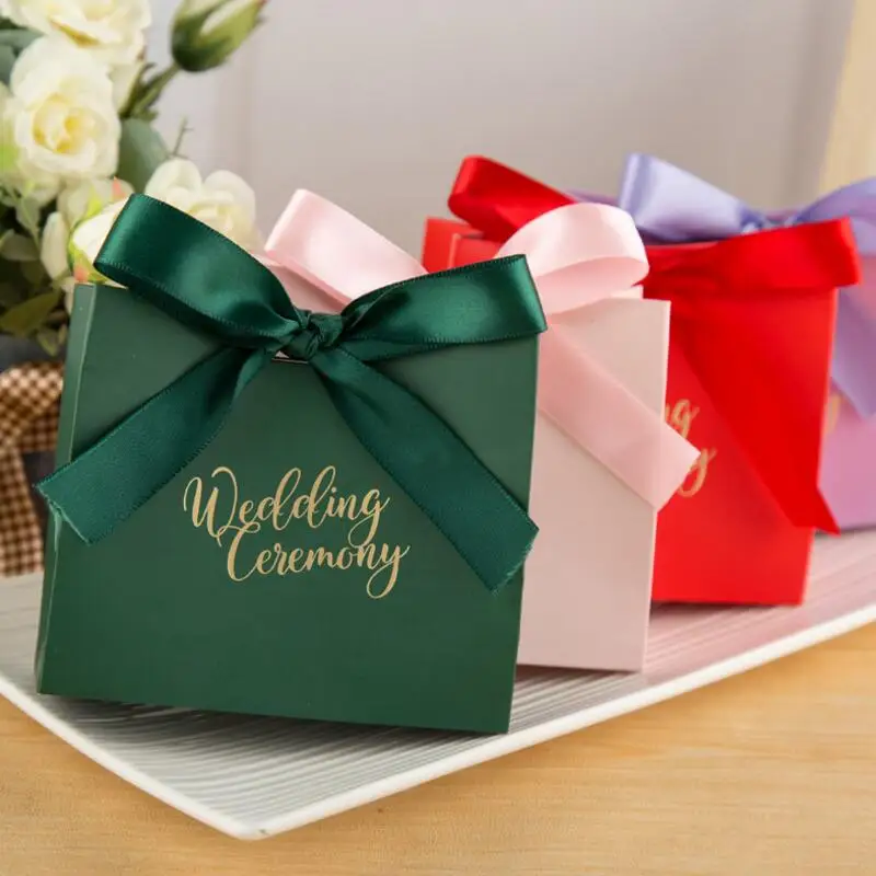 20pcs/lot Creative Paper Handbag Engagement Wedding Party Gifts Box Wedding Decor Paper Candy Box for Guest
20pcs/lot Creative Paper Handbag Engagement Wedding Party Gifts Box Wedding Decor Paper Candy Box for Guest