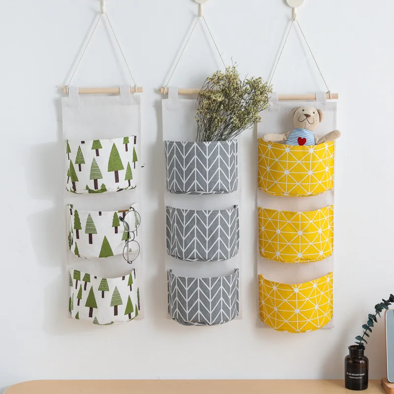 Creative Cotton Linen Hanging Storage toy Bag 3 Pockets Wall Mounted Wardrobe Hang Bag Wall Pouch Cosmetic Toys Organizer.
Creative Cotton Linen Hanging Storage toy Bag 3 Pockets Wall Mounted Wardrobe Hang Bag Wall Pouch Cosmetic Toys Organizer.