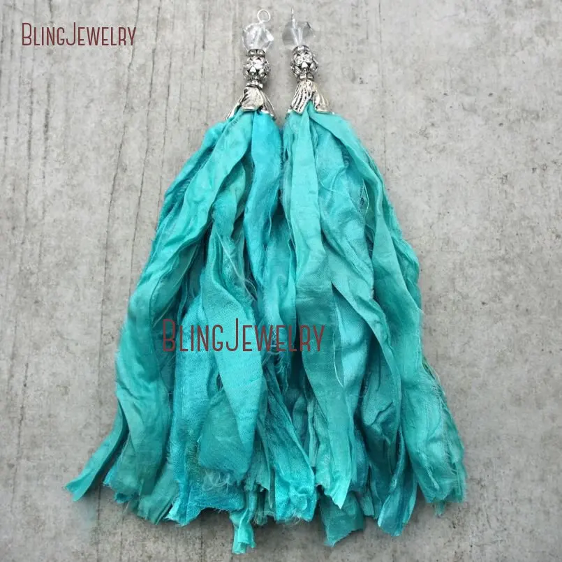 Turquoises Sari Silk Tassel Pendant Antique silver Cap and Crystal Accent PM9122
Turquoises Sari Silk Tassel Pendant Antique silver Cap and Crystal Accent PM9122