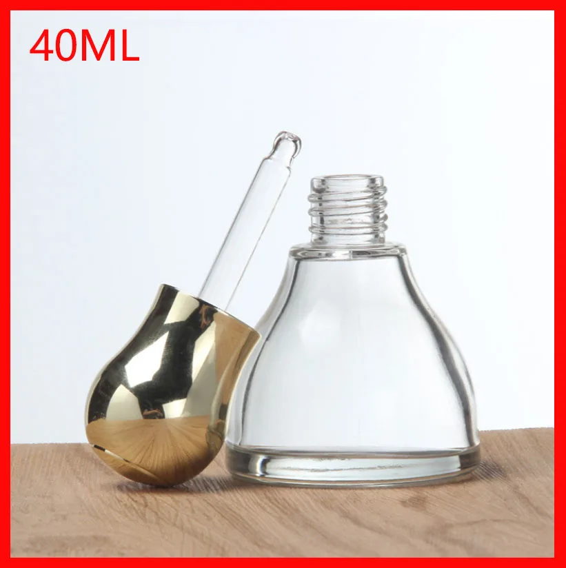 40ml Glass Essential oil bottle / Gold press lid / glass dropper bottle Serum hyaluronic acid cosmetic container 100pcs/lot
40ml Glass Essential oil bottle / Gold press lid / glass dropper bottle Serum hyaluronic acid cosmetic container 100pcs/lot