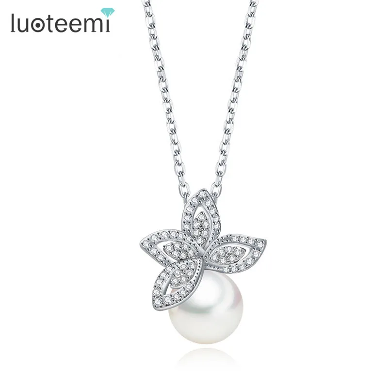 LUOTEEMI Fashion Simple Design Trendy Romantic Imitation Shell Pearl With Zircon Stone Leaf Pendant Necklace for Bridal Wedding
LUOTEEMI Fashion Simple Design Trendy Romantic Imitation Shell Pearl With Zircon Stone Leaf Pendant Necklace for Bridal Wedding