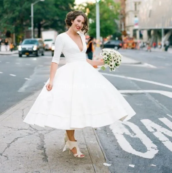 Vintage 50s Tea Length Wedding Dresses 2020 Deep V Neck Half Sleeve Ball Gown Satin Garden Country Bridal Gowns Vestido De Novi
Vintage 50s Tea Length Wedding Dresses 2020 Deep V Neck Half Sleeve Ball Gown Satin Garden Country Bridal Gowns Vestido De Novi
