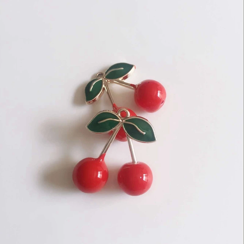 27*25MM 20Pcs/Pack Glazing Red Cherry KC Gold Charms Alloy Beads Jewelry Pendants
27*25MM 20Pcs/Pack Glazing Red Cherry KC Gold Charms Alloy Beads Jewelry Pendants