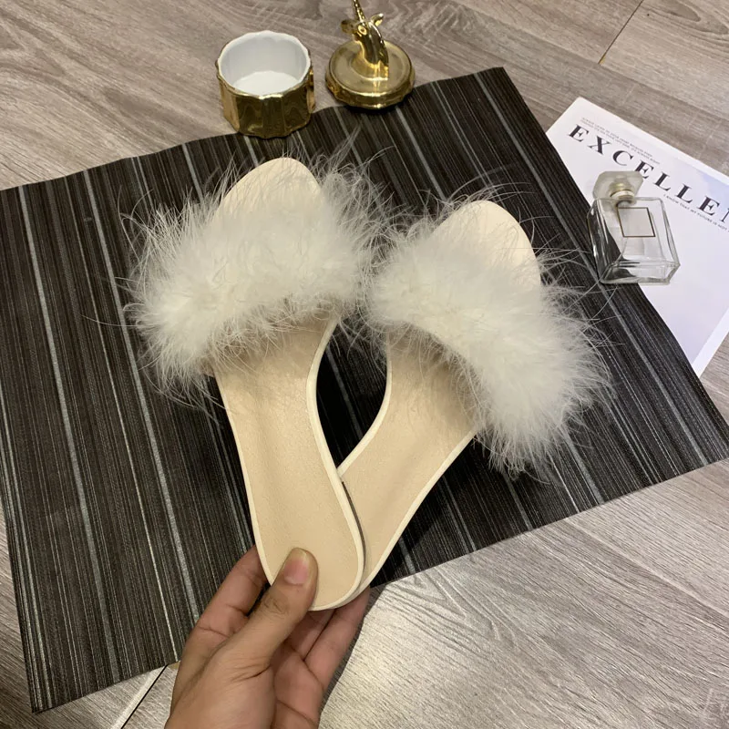 Hairy female Wearing a word belt 2019 summer new style Korean version of the wild red Flat fashion Lazy slippers Women's shoes
Hairy female Wearing a word belt 2019 summer new style Korean version of the wild red Flat fashion Lazy slippers Women's shoes