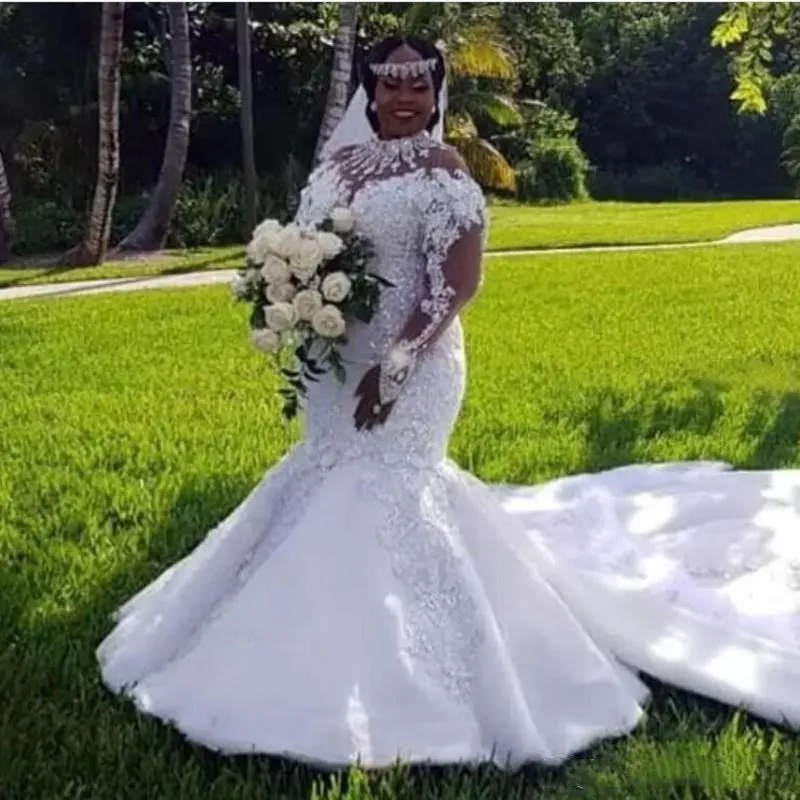African Plus Size Wedding Dresses 2021 High Neckline Illusion Long Sleeve Appliques Beaded Mermaid Bridal Gowns Court Train
African Plus Size Wedding Dresses 2021 High Neckline Illusion Long Sleeve Appliques Beaded Mermaid Bridal Gowns Court Train