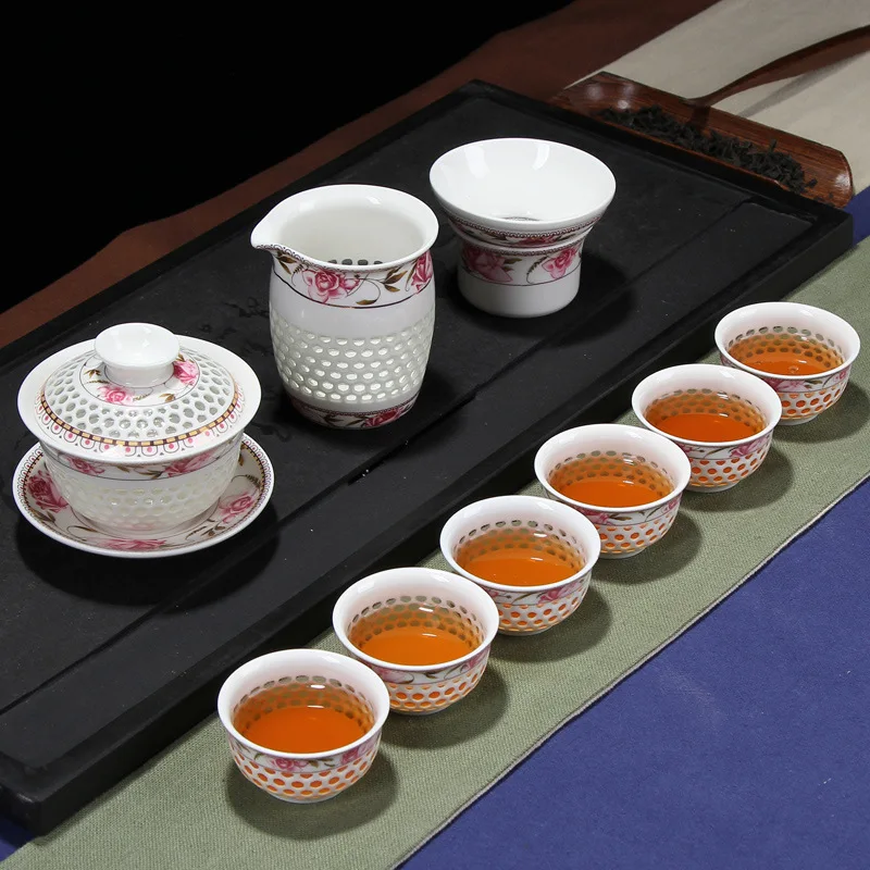Factory direct sales of the century flower honeycomb cover bowl (large) Kung Fu tea set gift box wholesale
Factory direct sales of the century flower honeycomb cover bowl (large) Kung Fu tea set gift box wholesale