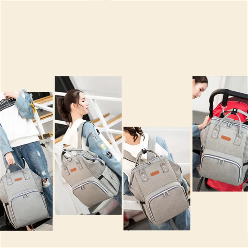 New Mummy bag milk powder diaper bottle Mummy backpack handbag multi-function shoulder upgrade version mother bag with USB mater
New Mummy bag milk powder diaper bottle Mummy backpack handbag multi-function shoulder upgrade version mother bag with USB mater