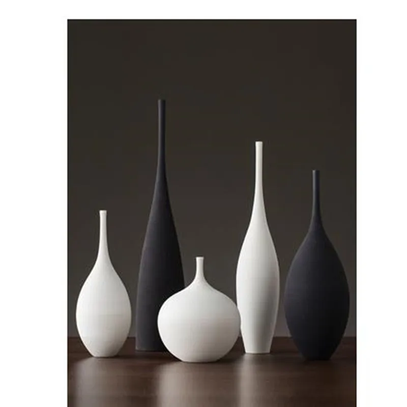 Ceramic vase decoration, home living room tabletop flower arrangement, modern creative porcelain crafts
Ceramic vase decoration, home living room tabletop flower arrangement, modern creative porcelain crafts