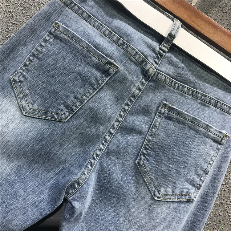 European 2019 Spring New Heavy Bead Rhinestone Fringed Hole Denim Trousers Skinny Female Students Stretch High Waist Jeans Pants
European 2019 Spring New Heavy Bead Rhinestone Fringed Hole Denim Trousers Skinny Female Students Stretch High Waist Jeans Pants