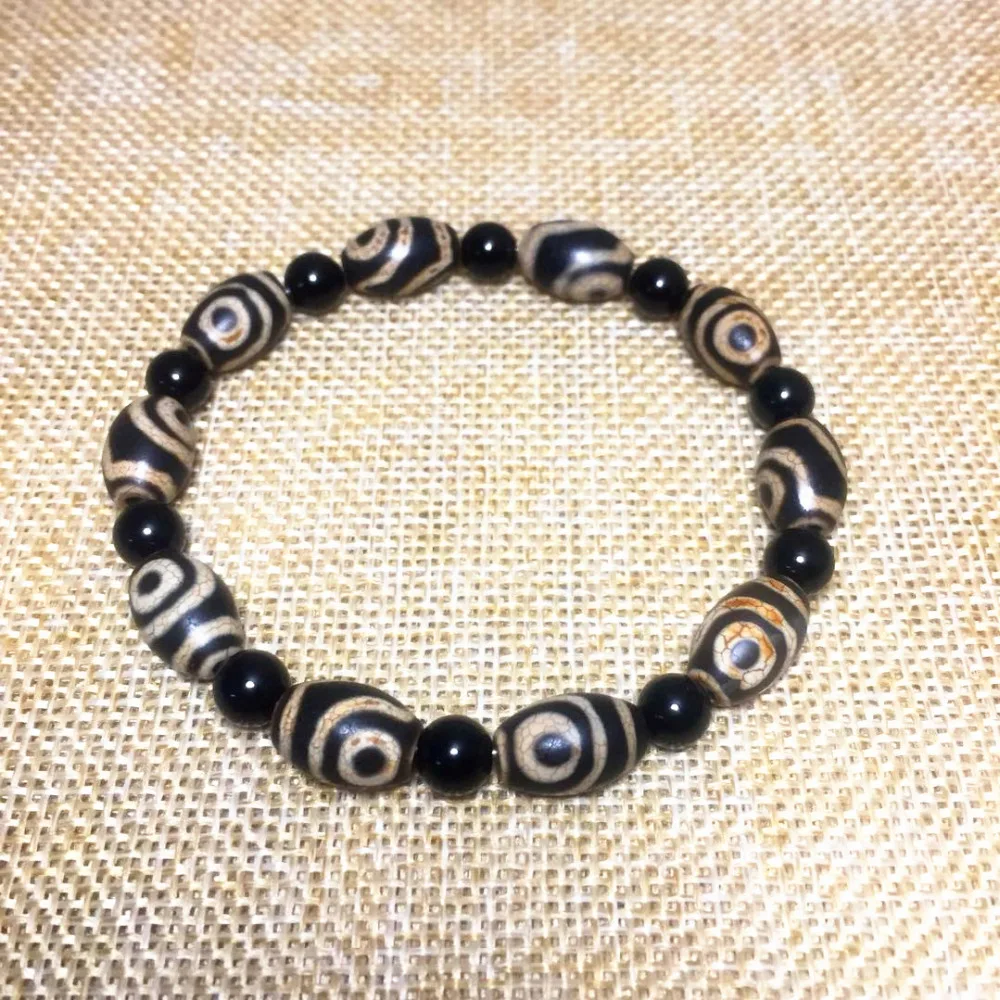 Tibetan Feng Shui DZI8*12mm rice-shaped beads 6mm old black agate bead string men and women jewelry bracelet Free Shipping
Tibetan Feng Shui DZI8*12mm rice-shaped beads 6mm old black agate bead string men and women jewelry bracelet Free Shipping