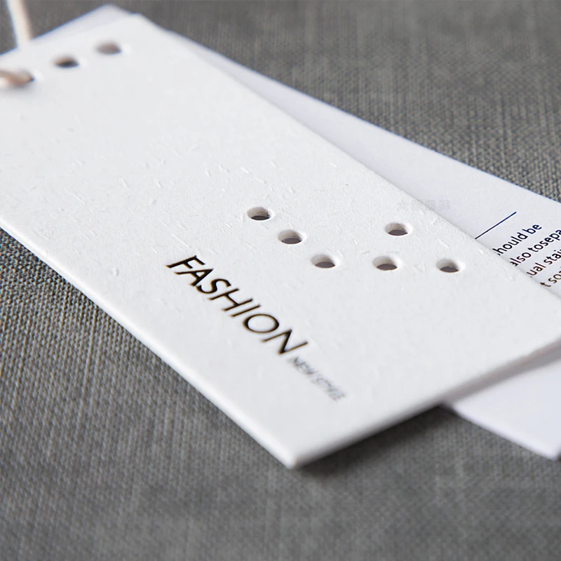Factory Price Custom High-End Heat Seal Printing Clothing hang tags Special card Paper Tags
Factory Price Custom High-End Heat Seal Printing Clothing hang tags Special card Paper Tags