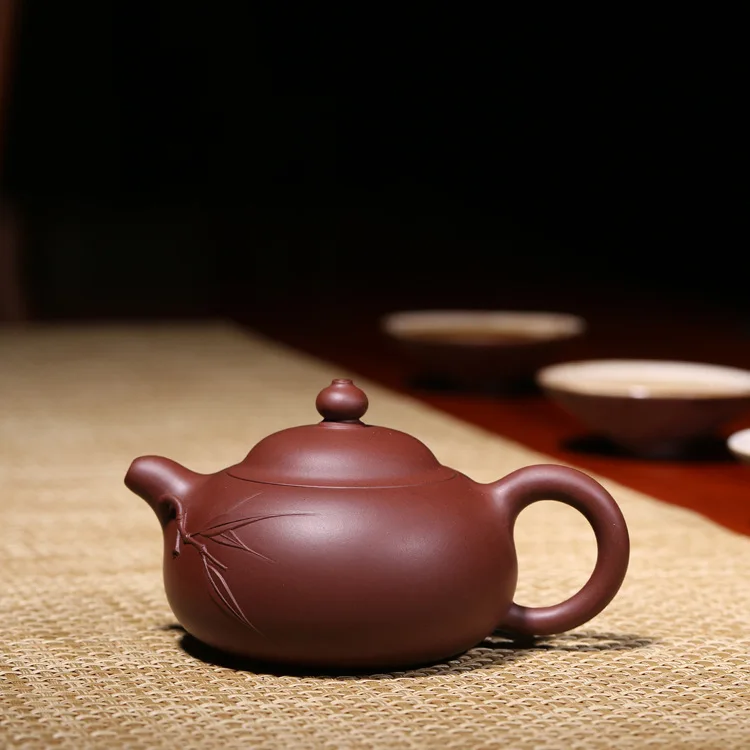 Purple Sand Teapot Master Wang Ting Handmade Bamboo Leaf Yuru Purple Sand Teapot Teapot Gift Customization Wholesale
Purple Sand Teapot Master Wang Ting Handmade Bamboo Leaf Yuru Purple Sand Teapot Teapot Gift Customization Wholesale