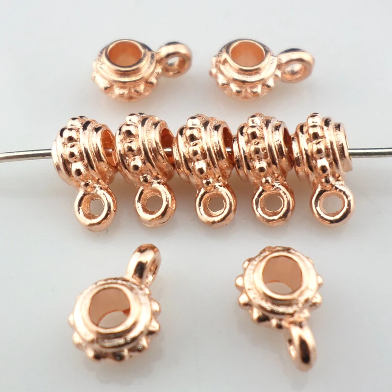 50pcs Alloy Rose Gold Connectors Spacer Bails Beads Charms Pendants 4x6.5x9mm Jewelry Findings
50pcs Alloy Rose Gold Connectors Spacer Bails Beads Charms Pendants 4x6.5x9mm Jewelry Findings