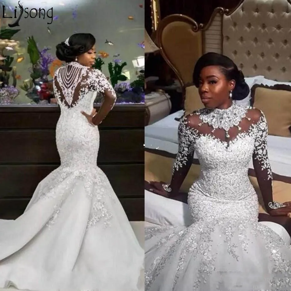 2019 Luxury Mermaid Wedding Dresses Sheer Long Sleeve High Neck Crystal Beads Chapel Train African Arabic Bridal Gowns Plus Size
2019 Luxury Mermaid Wedding Dresses Sheer Long Sleeve High Neck Crystal Beads Chapel Train African Arabic Bridal Gowns Plus Size