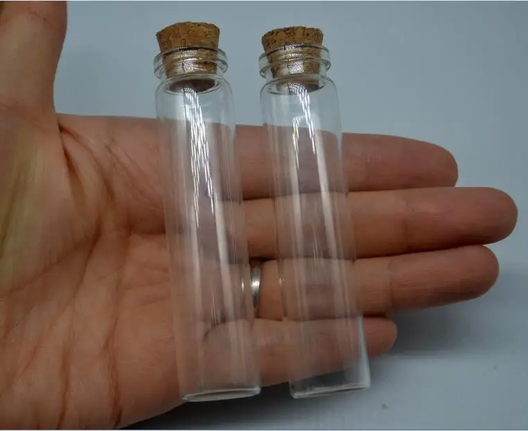 100pcs/lot 18x80mm transparent wishing glass bottle jars with wooden cork 80ml vial pendants glass globes diy finding
100pcs/lot 18x80mm transparent wishing glass bottle jars with wooden cork 80ml vial pendants glass globes diy finding