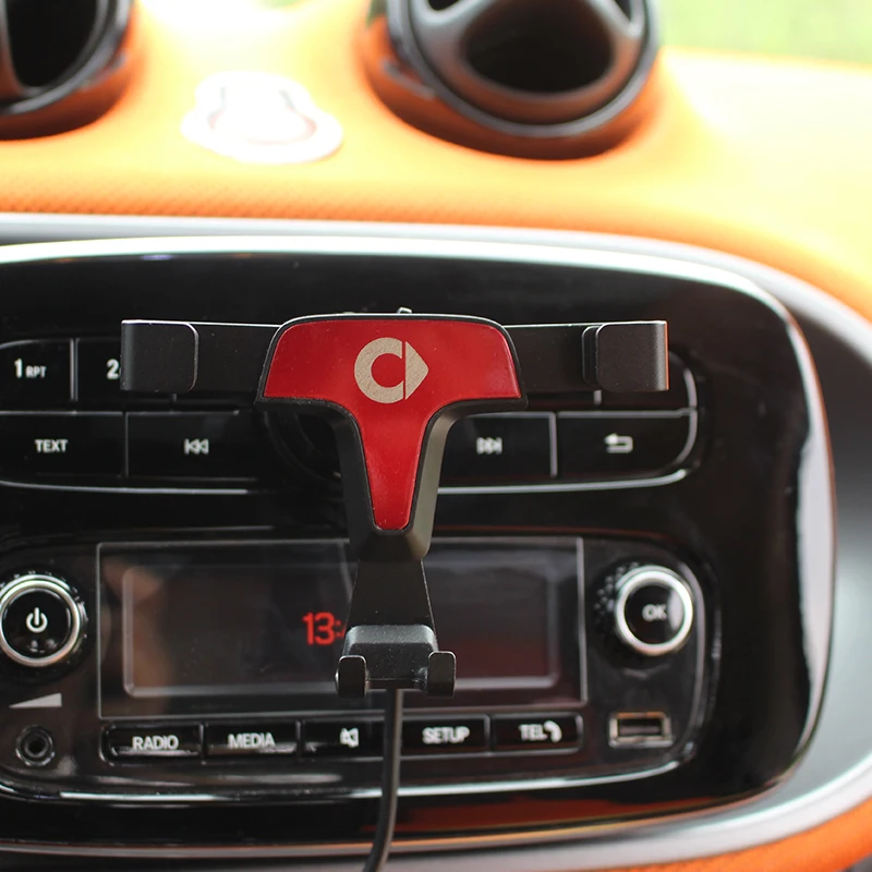 Gravity linkage mobile phone bracket Mobile charging navigation phone Holder for new Smart 453 fortwo forfour Car accessories
Gravity linkage mobile phone bracket Mobile charging navigation phone Holder for new Smart 453 fortwo forfour Car accessories