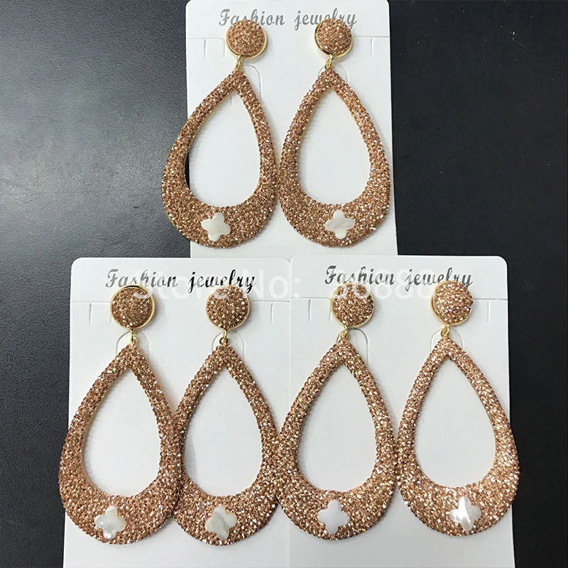 Fashionable super flash drop shape shell earrings sweet peach color long eardrop
Fashionable super flash drop shape shell earrings sweet peach color long eardrop