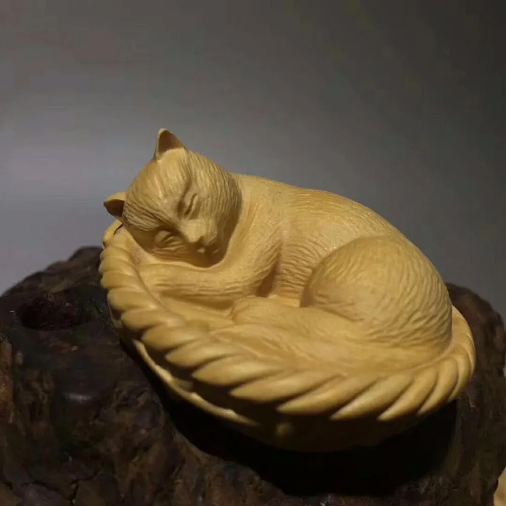 Boxwood hand pieces of wood carving small Cat Pendant ornaments handicrafts with lovely car.
Boxwood hand pieces of wood carving small Cat Pendant ornaments handicrafts with lovely car.