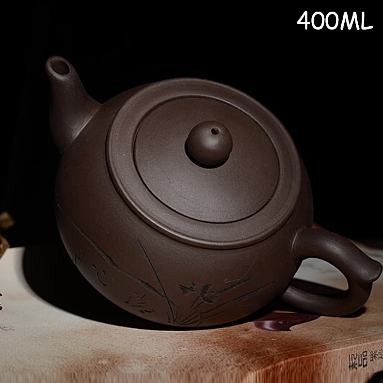 Yixing authentic handcraft teapot ore purple clay large capacity 400 ml of high-grade gift teapot
Yixing authentic handcraft teapot ore purple clay large capacity 400 ml of high-grade gift teapot