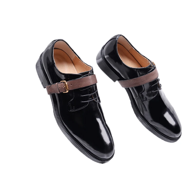 Stylist leather shoes tie up British fashionable gentleman pointy patchwork bright leather shoes dress shoes.
Stylist leather shoes tie up British fashionable gentleman pointy patchwork bright leather shoes dress shoes.