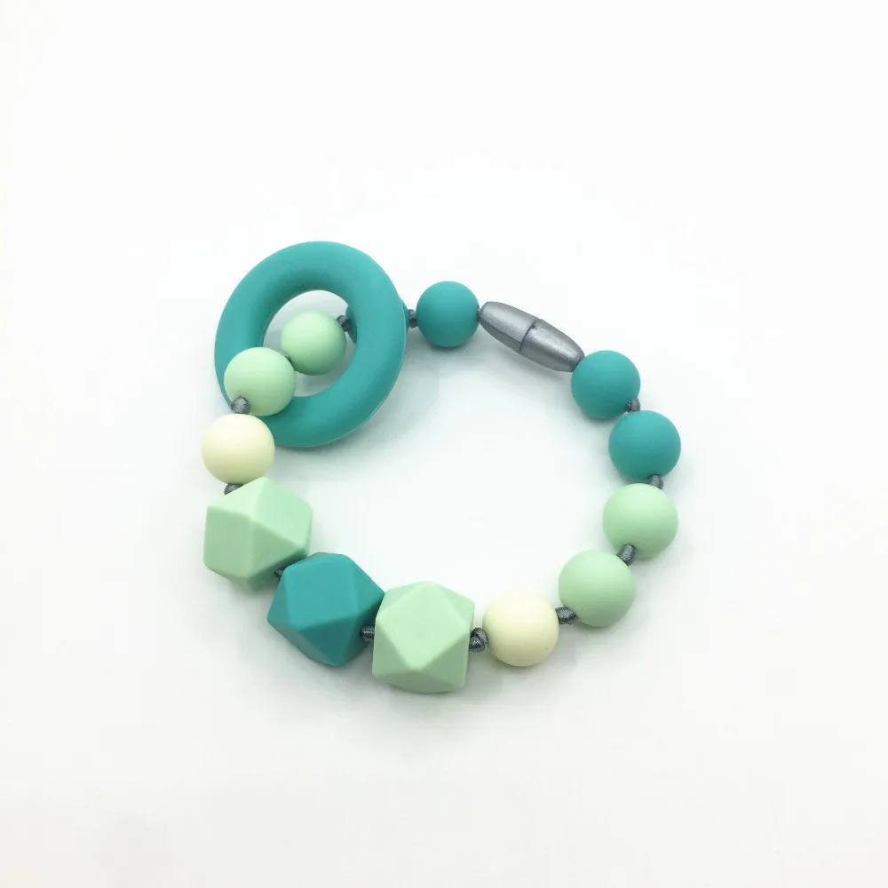 Travel Teething ring Chewable Teether Silicone Teething Baby Shower Gift Sensory Colour Rainbow Chewable Toy
Travel Teething ring Chewable Teether Silicone Teething Baby Shower Gift Sensory Colour Rainbow Chewable Toy
