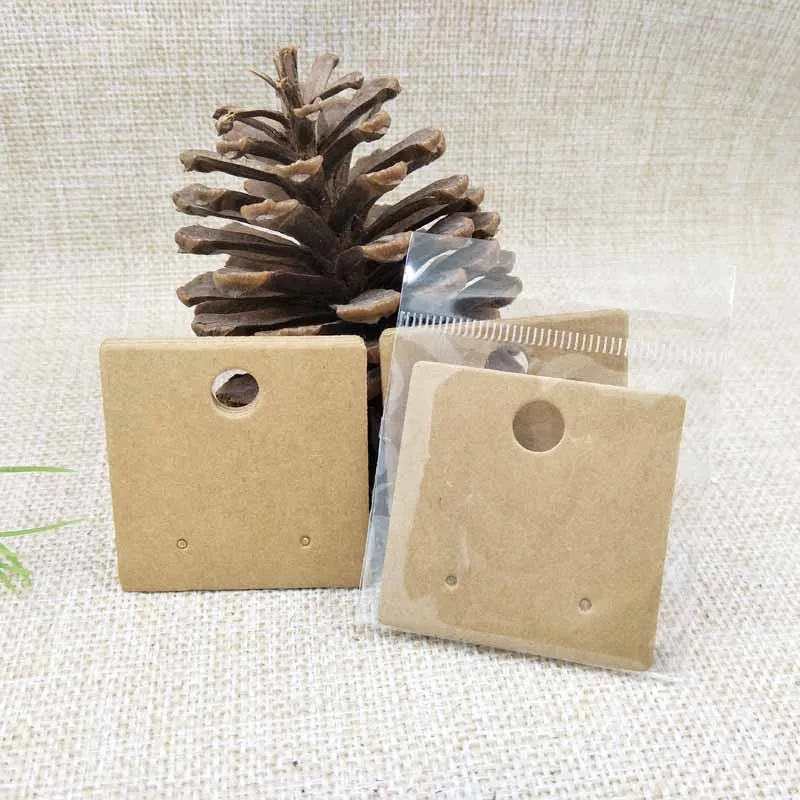 Cardboard kraft/white square shape 5*5cm stud earring display packing card products show card 100pcs +100 plastic bag match
Cardboard kraft/white square shape 5*5cm stud earring display packing card products show card 100pcs +100 plastic bag match