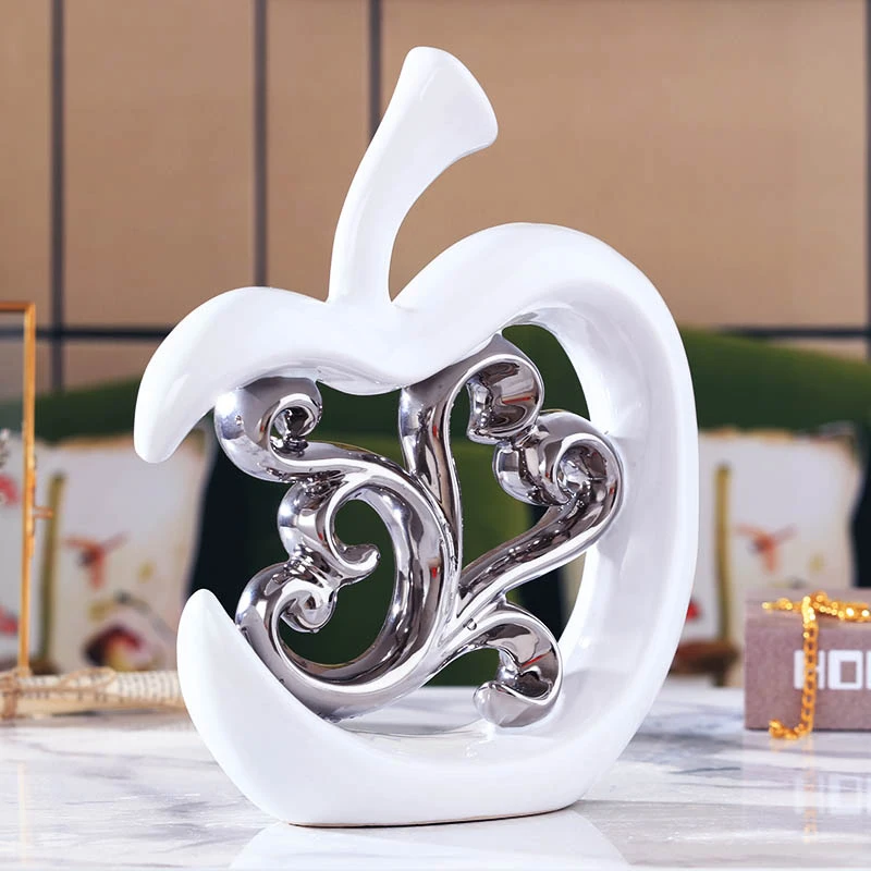 Nordic home decoration Ceramic crafts Modern simple home decor living room wine cabinet decorations silver hollow apple ornament
Nordic home decoration Ceramic crafts Modern simple home decor living room wine cabinet decorations silver hollow apple ornament