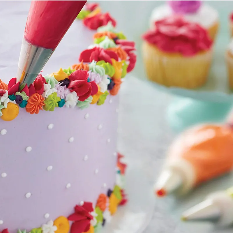 Wilton Decorating Piping Tip Set - Cake Decorating Supplies Set with 22 Piece Icing Tips, 1 Standard Coupler, 1 Flower Nail
Wilton Decorating Piping Tip Set - Cake Decorating Supplies Set with 22 Piece Icing Tips, 1 Standard Coupler, 1 Flower Nail