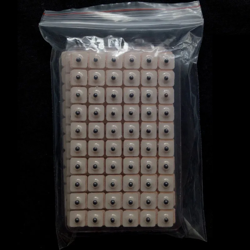 Auricular application line seed paste ears bean, ear acupoint pressure massage
Auricular application line seed paste ears bean, ear acupoint pressure massage