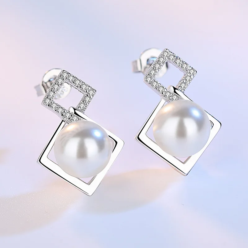 100% 925 sterling silver fashion pearl crystal stud earrings for women wholesale jewelry Christmas gift drop shipping
100% 925 sterling silver fashion pearl crystal stud earrings for women wholesale jewelry Christmas gift drop shipping