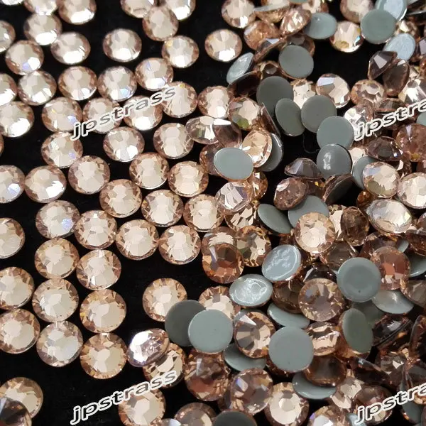 crystal rhinestone for fashionable design ss16 lt peach color with 1440 pcs per pack ;14 cutting facets stones free shipping
crystal rhinestone for fashionable design ss16 lt peach color with 1440 pcs per pack ;14 cutting facets stones free shipping