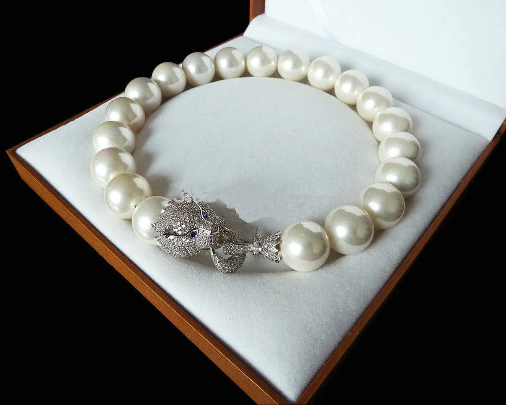 Free Shipping design Natural 18'' 16mm white shell pearl inlay zircon leopard head LUXURY necklace
Free Shipping design Natural 18'' 16mm white shell pearl inlay zircon leopard head LUXURY necklace