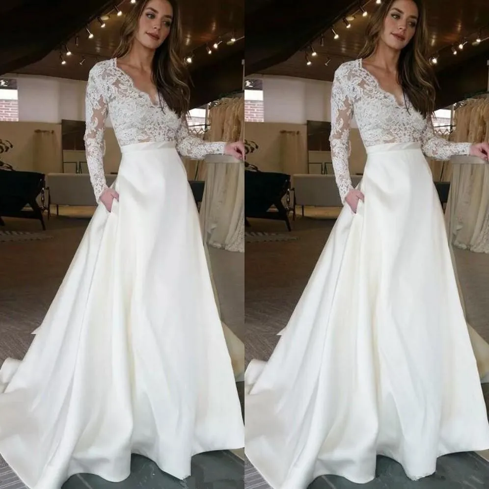 Long Sleeve Wedding Dresses 2021 Sexy Boho V-Neck See-Through Pocket Ivory Lace A-Line Beach Wedding gown Vestido de Noiva Praia
Long Sleeve Wedding Dresses 2021 Sexy Boho V-Neck See-Through Pocket Ivory Lace A-Line Beach Wedding gown Vestido de Noiva Praia