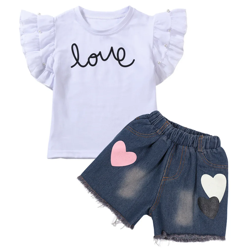 2019 Summer Wear Toddler Girl Pearl Flying Sleeve Short Sleeve T Pity + Cowboy Shorts Love Twinset Girls Children Clothing Set
2019 Summer Wear Toddler Girl Pearl Flying Sleeve Short Sleeve T Pity + Cowboy Shorts Love Twinset Girls Children Clothing Set