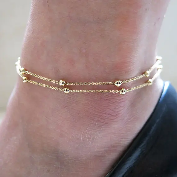 2016 Handmade Gold Silver Plated Charms Fashion Double Layer Anklets Small Beads Anklets Summer Beach Foot Jewelry For Women
2016 Handmade Gold Silver Plated Charms Fashion Double Layer Anklets Small Beads Anklets Summer Beach Foot Jewelry For Women