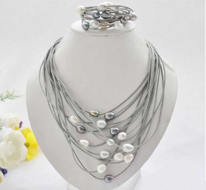 Hot sell Noble- P5225 15row 13mm black white gray rice pearl gray leather necklace & bracelet Meticulous and picturesque
Hot sell Noble- P5225 15row 13mm black white gray rice pearl gray leather necklace & bracelet Meticulous and picturesque