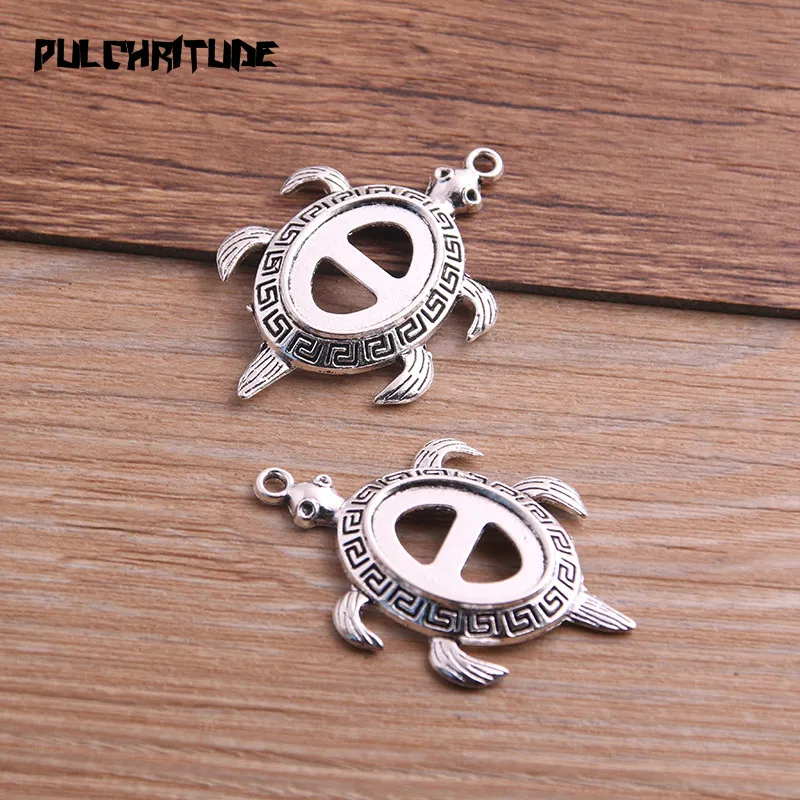 6pcs 13*18mm Inner Size Antique Silver Color Metal Alloy Simple Tortoise Cabochon Pendant Setting Jewelry Findings
6pcs 13*18mm Inner Size Antique Silver Color Metal Alloy Simple Tortoise Cabochon Pendant Setting Jewelry Findings
