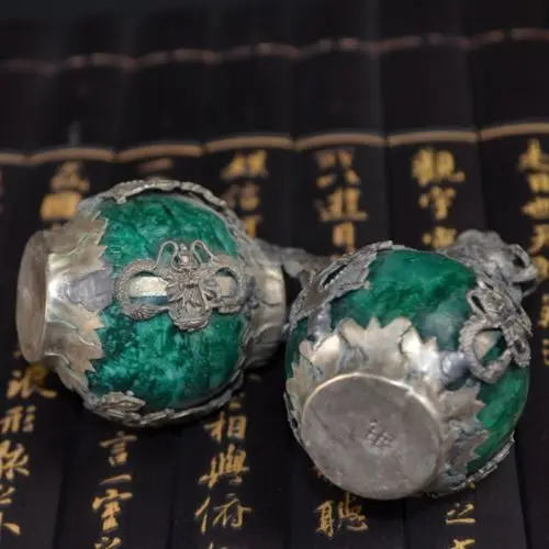 A Pair of Antique collection old Tibetan Silver Lion Package Imitation Green Jade Statue
A Pair of Antique collection old Tibetan Silver Lion Package Imitation Green Jade Statue