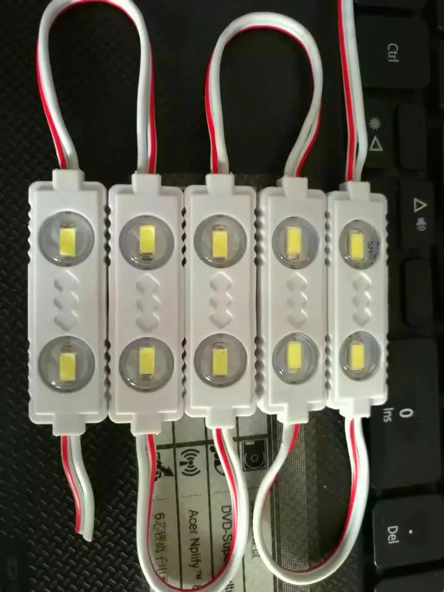 5730 SMD waterproof constant voltage LED Module;DC12V,0.7W;high bright;20pcs/string;size:45*15;IP65
5730 SMD waterproof constant voltage LED Module;DC12V,0.7W;high bright;20pcs/string;size:45*15;IP65