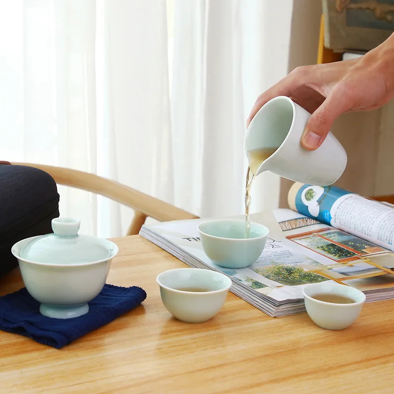 Travel tea set porcelain celadon cup, Gaiwan tea set, a pot of three cups of portable travel bags gift
Travel tea set porcelain celadon cup, Gaiwan tea set, a pot of three cups of portable travel bags gift