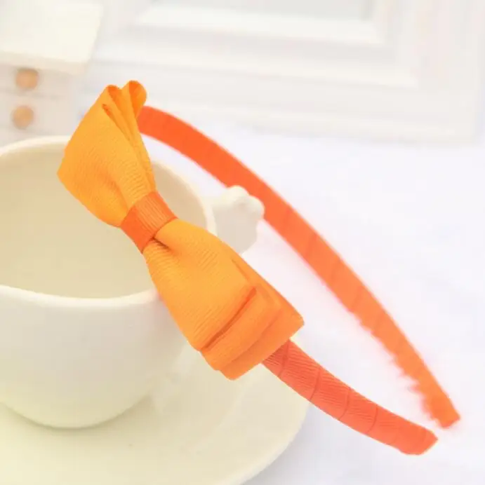 Free Shipping Wholesale 100pcs wrapped grosgrain ribbon headband with Classic Ribbon Bow
Free Shipping Wholesale 100pcs wrapped grosgrain ribbon headband with Classic Ribbon Bow