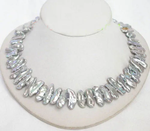 NEW AA baroque tooth gray BIWA pearls necklace 18"
NEW AA baroque tooth gray BIWA pearls necklace 18"