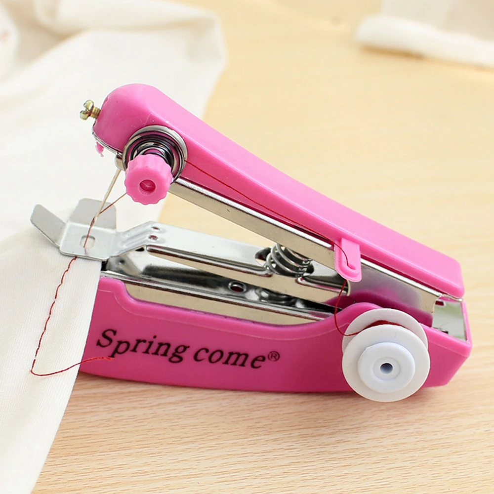 Mini Home Hand-Held Single Stitch Clothes Portable Sewing Machine creative home small pocket-sized manual sewing machines RX104
Mini Home Hand-Held Single Stitch Clothes Portable Sewing Machine creative home small pocket-sized manual sewing machines RX104