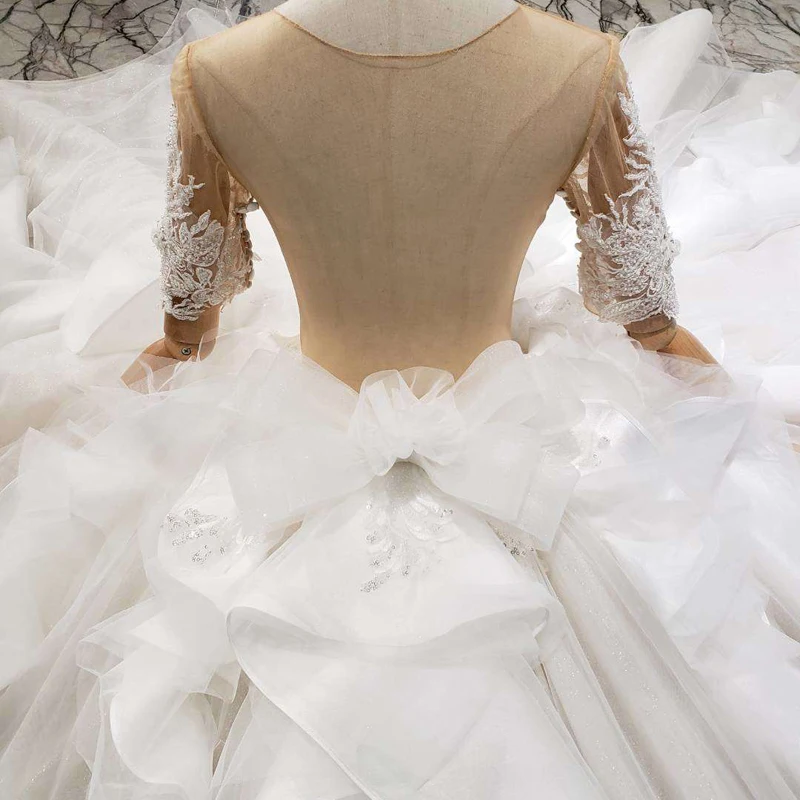 LS20097 ruffle style wedding dresses like white short sleeves illusion back zipper luxury handmade ball gown wedding gowns 2020
LS20097 ruffle style wedding dresses like white short sleeves illusion back zipper luxury handmade ball gown wedding gowns 2020